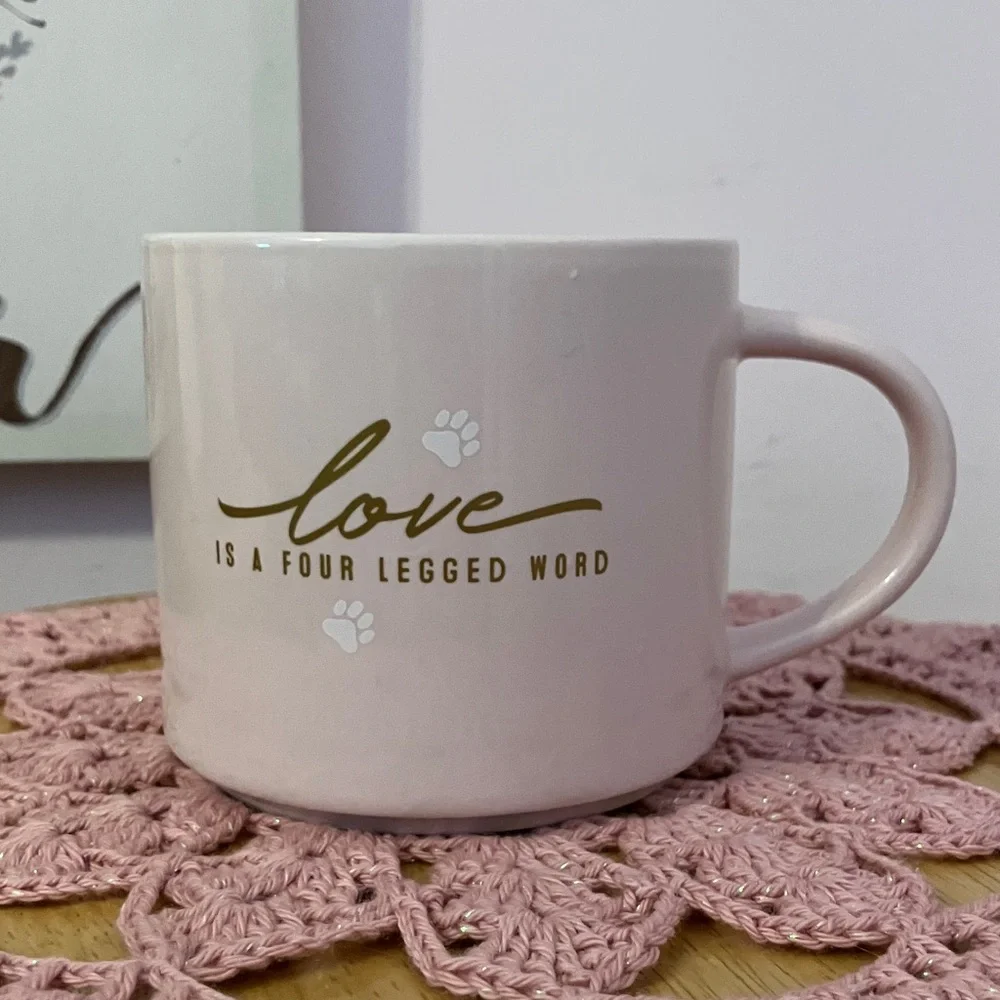 Pretty Pink Mug reads “love is a four legged word”!